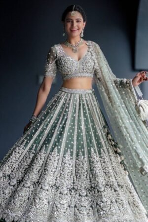 Alluring Green Sequins Net Engagement Wear Lehenga Choli With Dupatta