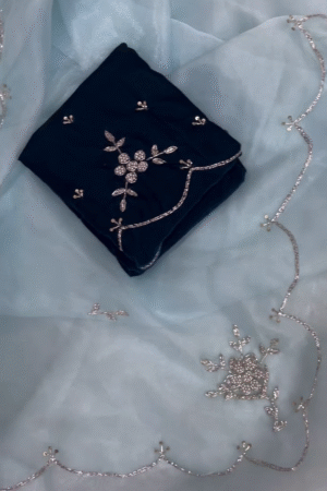 Navy Blue Embroidered Blouse with Light Blue Net Saree Featuring Silver Floral Handwork and Scalloped Borders – Perfect for Festive and Special Occasions