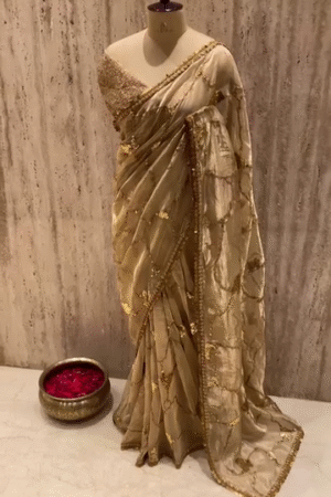 Luxurious Golden Designer Organza Saree with Intricate Sequin and Thread Embroidery, Handcrafted Detailing, and Embellished Border – Perfect for Weddings, Festive Celebrations, and Grand Occasions