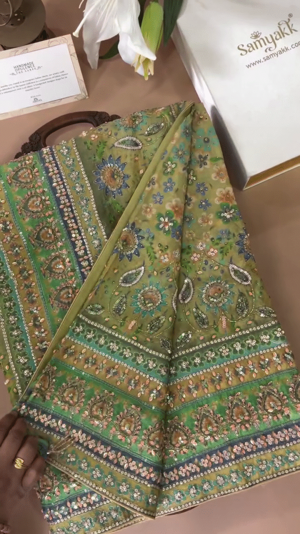 Exquisite Olive Green Designer Saree Set Featuring All-Over Multi-Colored Floral Embroidery, Hand-Embellished Sequins and Zardozi Detailing on Net Fabric with Coordinated Embroidered Blouse – Ideal for Grand Celebrations, Sangeet, or Reception Wear - Image 2