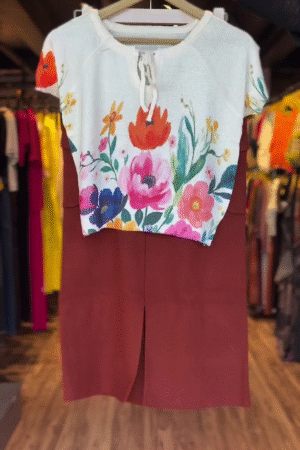 Chic Two-Piece Casual Wear Set with White Short Sleeve Floral Printed Top Featuring Front Tie Detail Paired with High-Waisted Rust Brown Knee-Length Skirt with Front Slit and Back Patch Pockets
