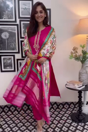 Hot Pink Straight-Cut Embroidered Kurta with Golden Threadwork on Neckline, Paired with Coordinated Trousers and a Vibrant Multicolor Printed Dupatta – A Perfect Blend of Traditional Charm and Modern Grace