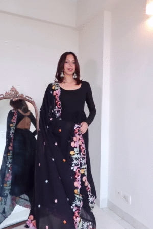 Black Anarkali Kurta with Sheer Full Sleeves Paired with a Beautifully Embroidered Multicolor Floral Dupatta Featuring Delicate Thread Work and Tassel Detailing – Perfect for Festive and Ethnic Occasions