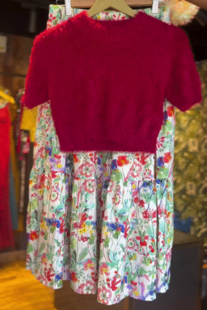 Red Fuzzy Knit Crop Top Paired with a Colorful Tiered Floral Maxi Skirt – Playful and Elegant Coordinated Outfit for Spring and Summer