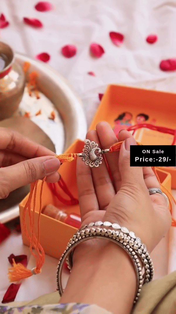 Elegant Red and Yellow Mauli Thread Rakhi Featuring Intricately Designed Antique Silver-Tone Floral Charm – A Traditional and Thoughtful Raksha Bandhan Bracelet for Brother - Image 2