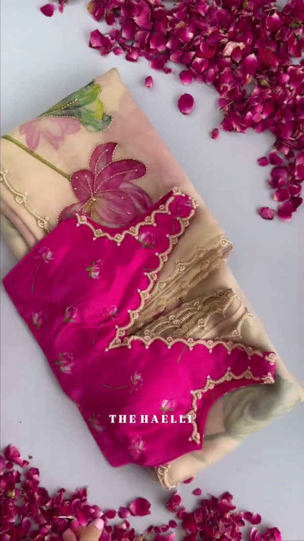 Handpainted Organza Saree with Intricate Lotus Motifs and Scallop Embroidered Borders Paired with a Vibrant Magenta Floral Blouse – A Perfect Blend of Tradition and Artistic Charm