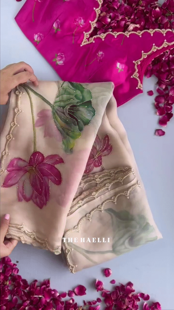 Handpainted Organza Saree with Intricate Lotus Motifs and Scallop Embroidered Borders Paired with a Vibrant Magenta Floral Blouse – A Perfect Blend of Tradition and Artistic Charm - Image 2