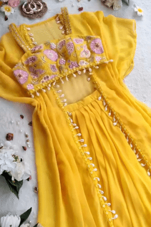 Yellow Georgette Three-Piece Set Featuring Embroidered Mirror Work Blouse with Shell Detailing and Flowy Cape Style Jacket for Festive and Ethnic Occasions