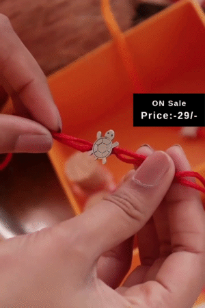 Cute Turtle Charm Rakhi with Red Thread – Adorable and Meaningful Wrist Accessory for Kids, Symbolizing Protection and Good Luck, Perfect for Raksha Bandhan Gifting