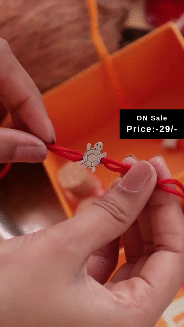 Cute Turtle Charm Rakhi with Red Thread – Adorable and Meaningful Wrist Accessory for Kids, Symbolizing Protection and Good Luck, Perfect for Raksha Bandhan Gifting