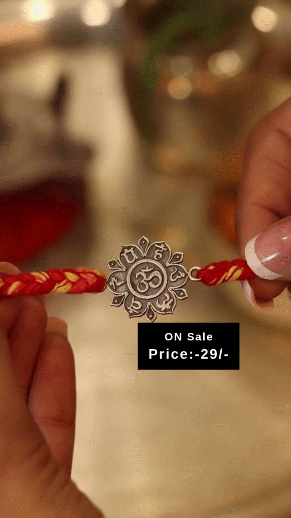 Traditional Om Symbol Rakhi with Intricate Floral Design and Braided Red-Yellow Thread – Perfect Spiritual Gift for Raksha Bandhan to Celebrate Sibling Bond with Divine Blessings - Image 2