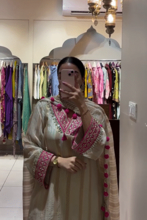 Embroidered Beige Kurta with Pink Pom Pom Tassels – Stylish and Traditional Ethnic Wear for Women
