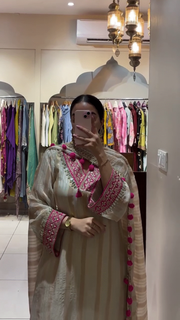 Embroidered Beige Kurta with Pink Pom Pom Tassels – Stylish and Traditional Ethnic Wear for Women